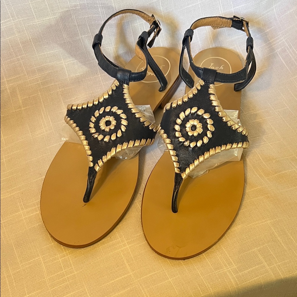Chic Black and Tan Sandals with Intricate Design